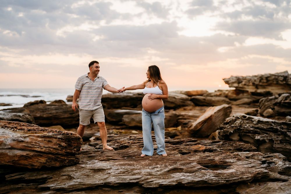 fun couple pregnancy photography in Little Bay in Sydney's Eastern Suburbs