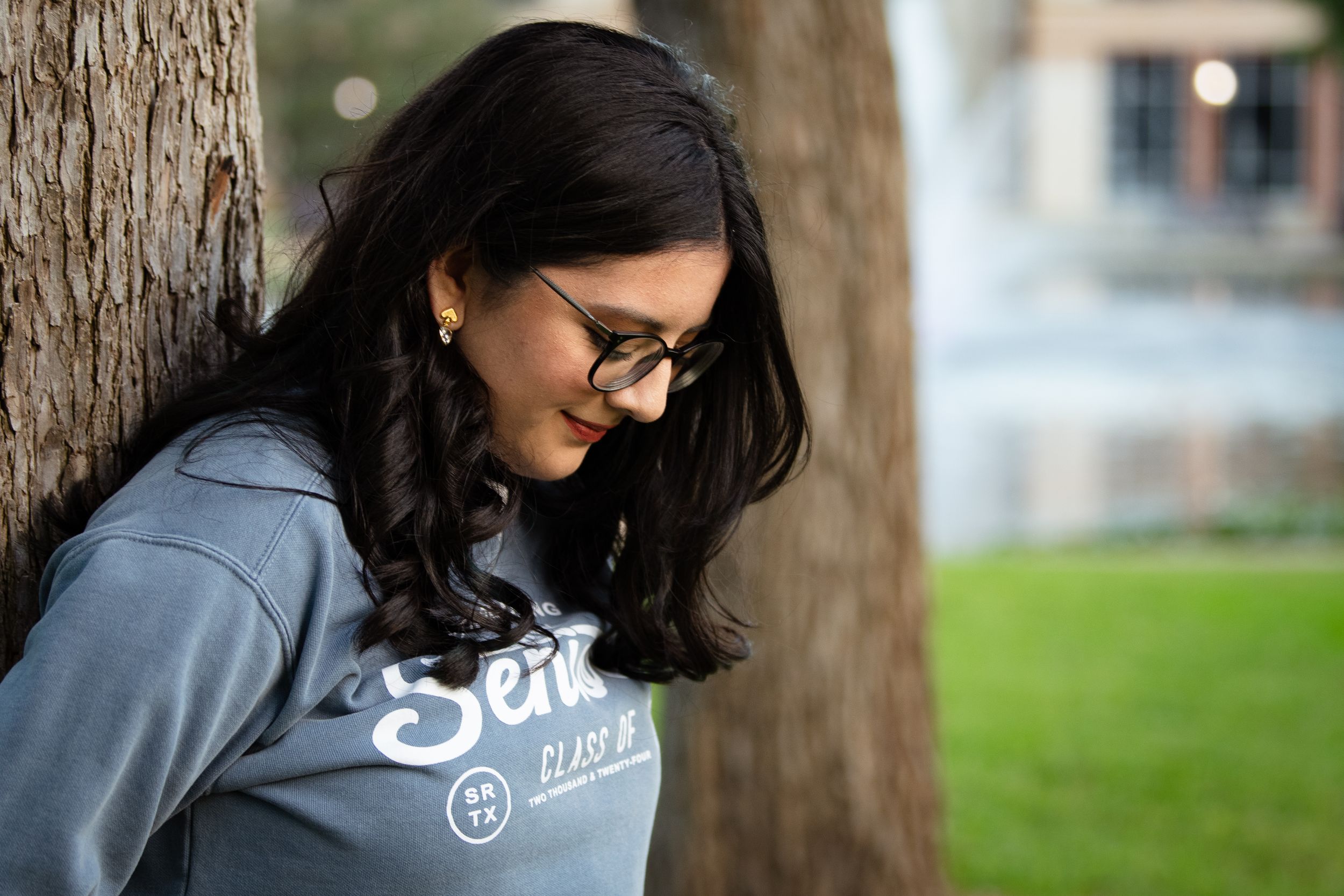 Image of female high school graduate.