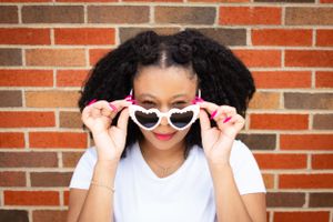 Image of female in sunglasses