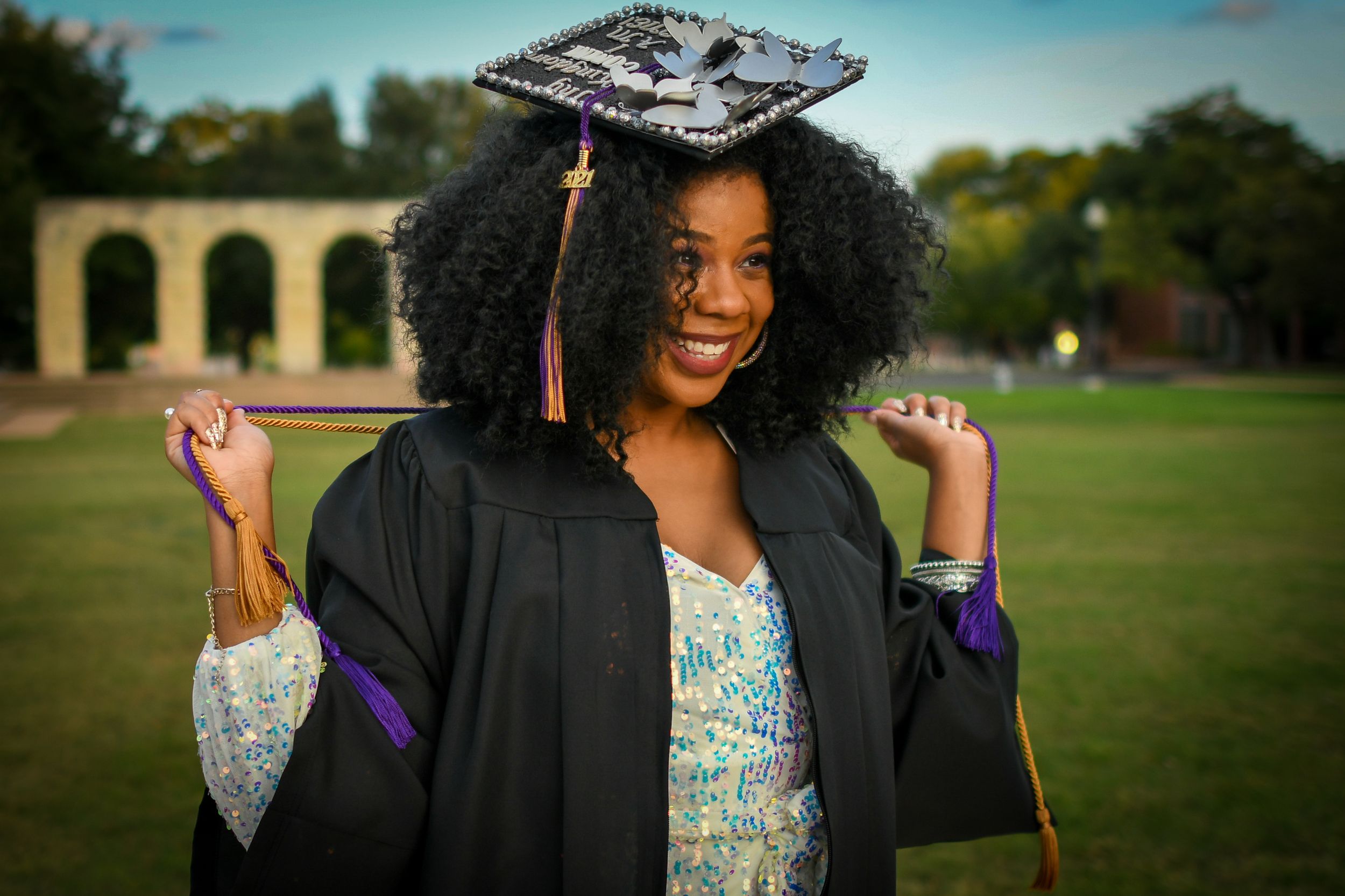 Image of female college graduate.