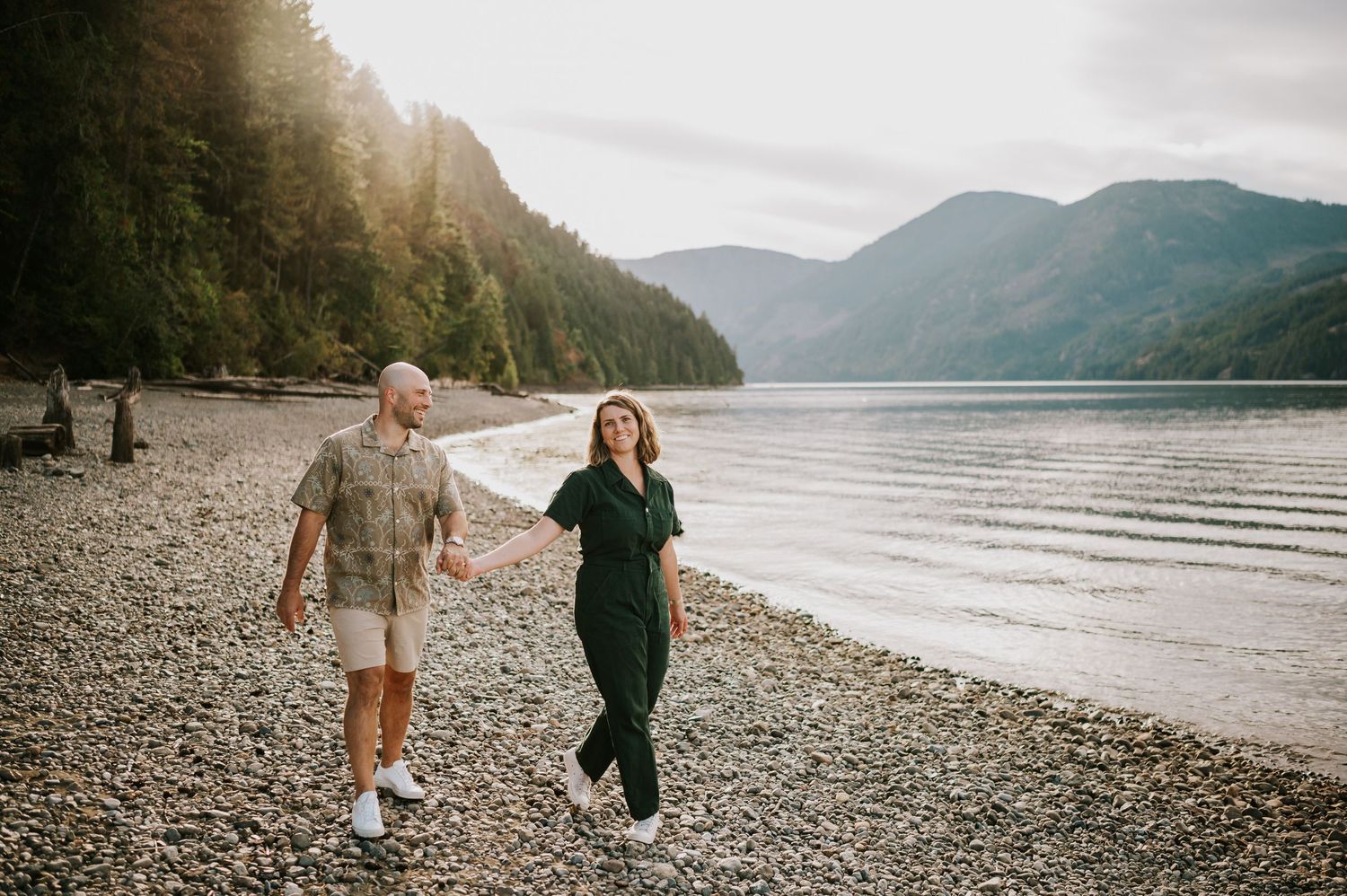 Comox Valley Photographer Portraits at Comox Lake in Cumberland, Vancouver Island. couple holding hands walking