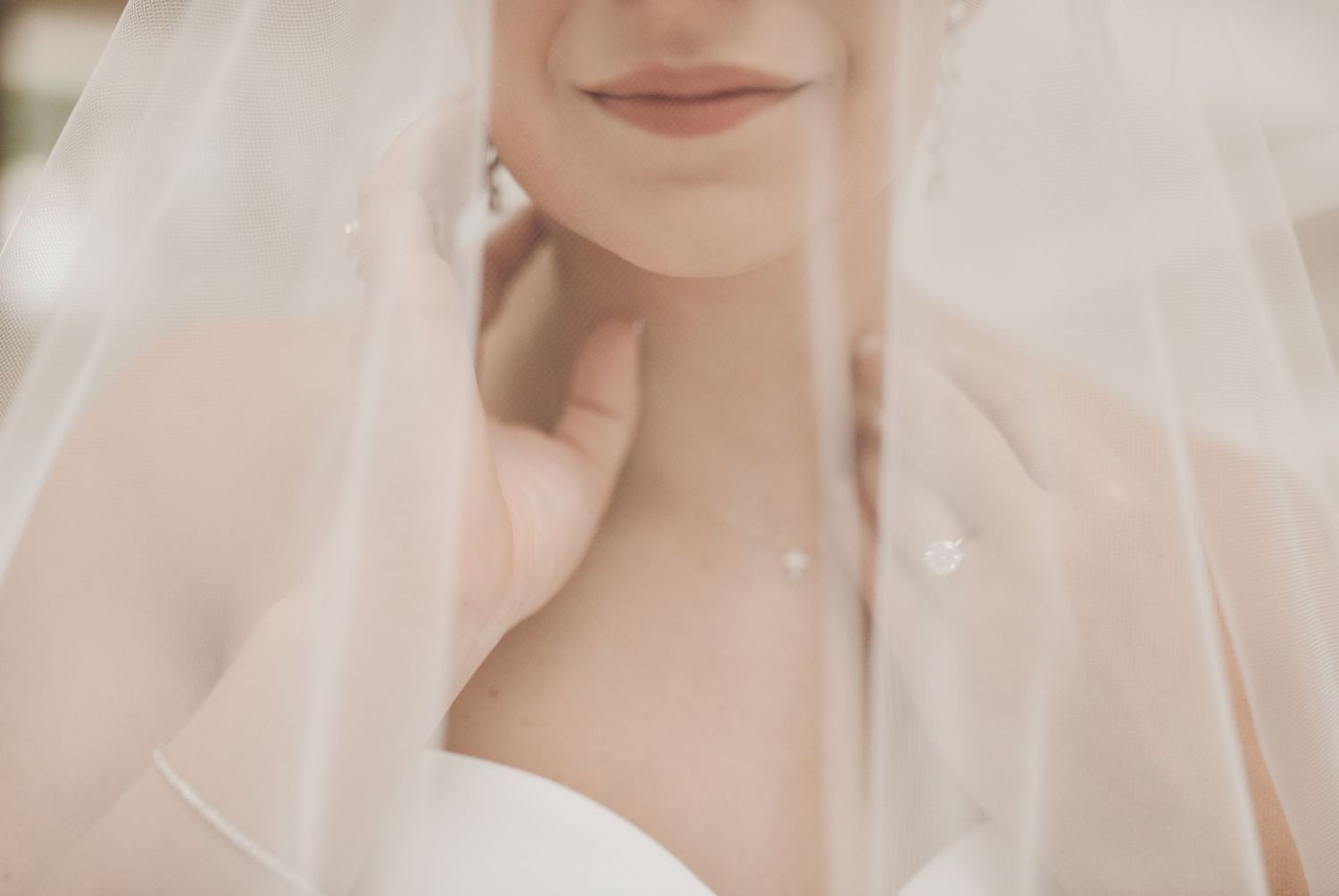 Modern Dallas bridal portrait with a classic white wedding gown and elegant bouquet