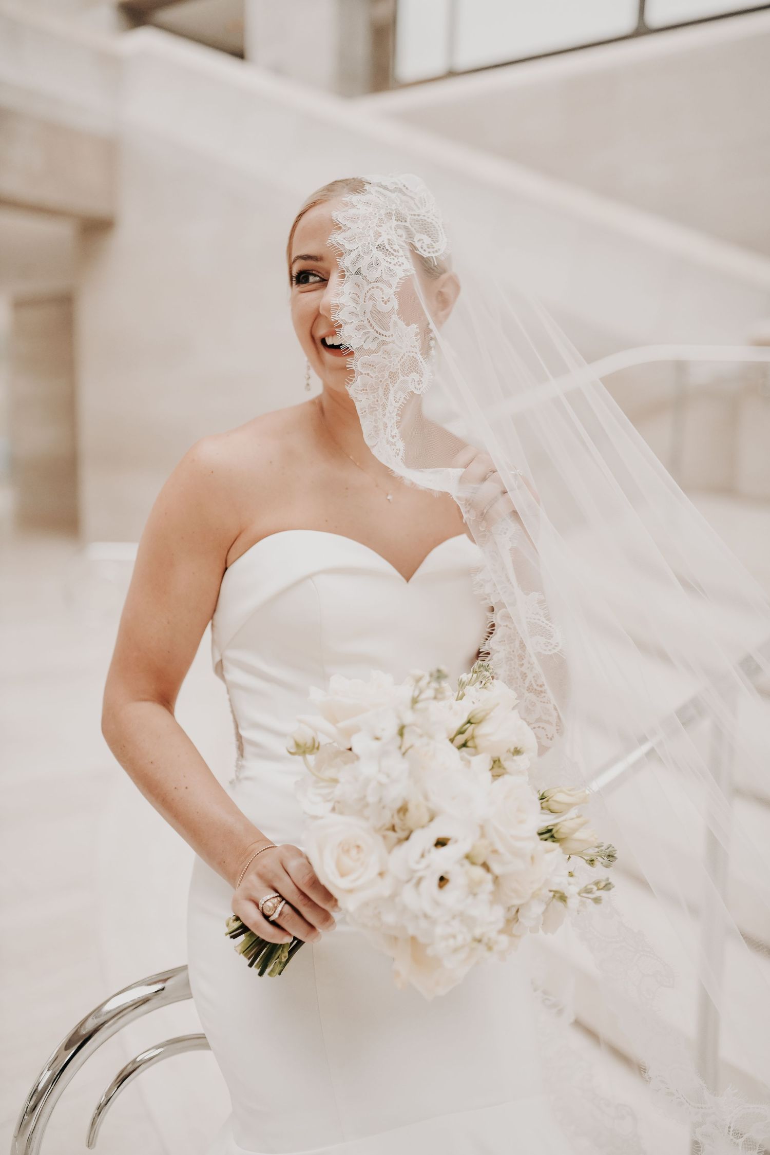 Dallas bridal photographer capturing an elegant bride against the Meyerson’s iconic architecture