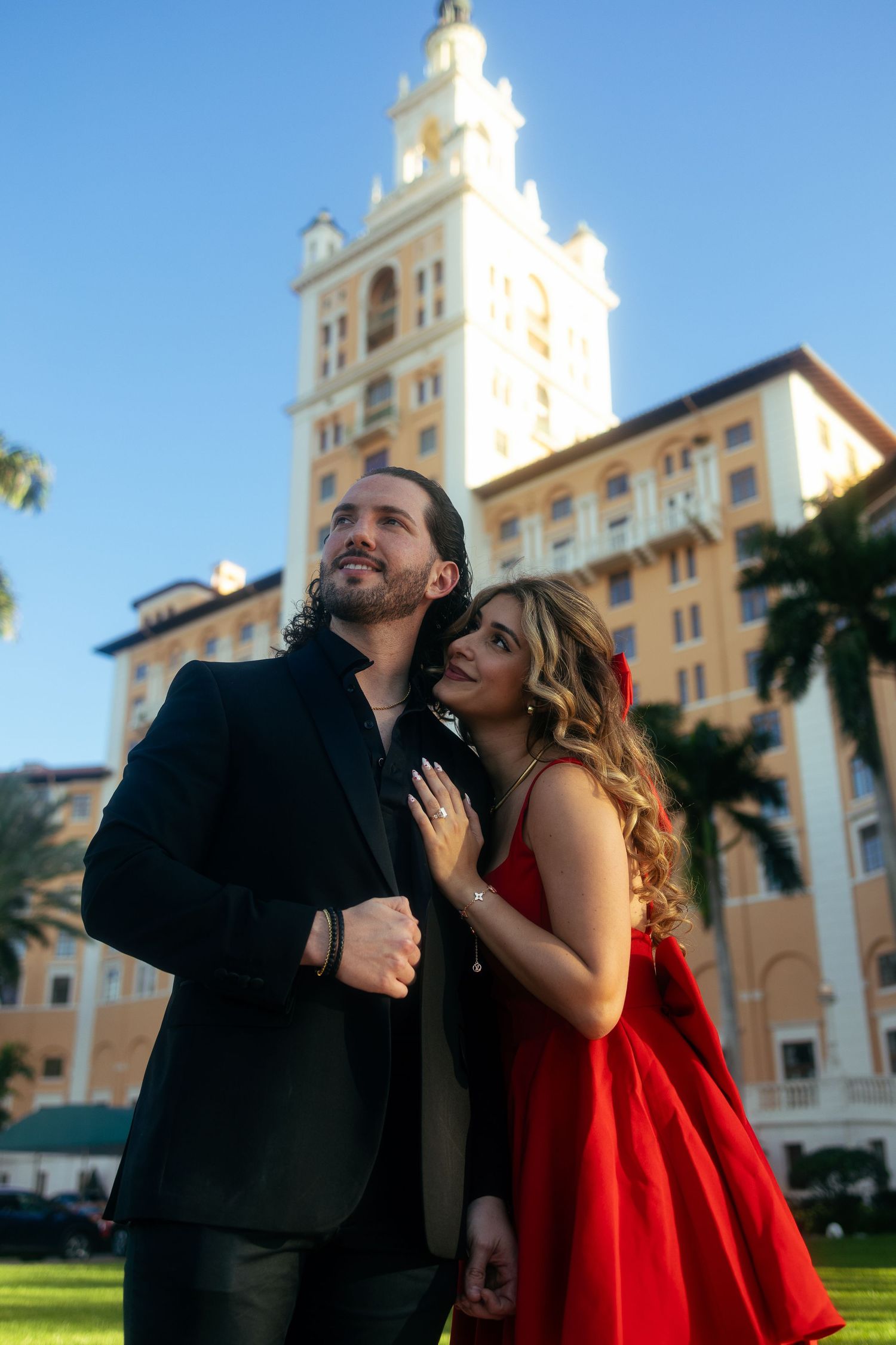 Cinematic couples portrait in downtown Miami with colorful editorial styling