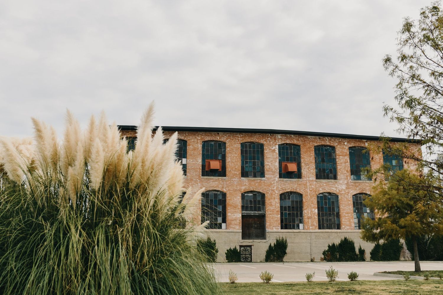 Exterior of The Cotton Mill wedding venue in McKinney, Texas