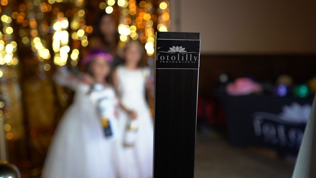 Professional photo booth rental for Quinceañera events featuring luxury mirror booth with instant prints in Dallas Fort Worth Texas DFW
