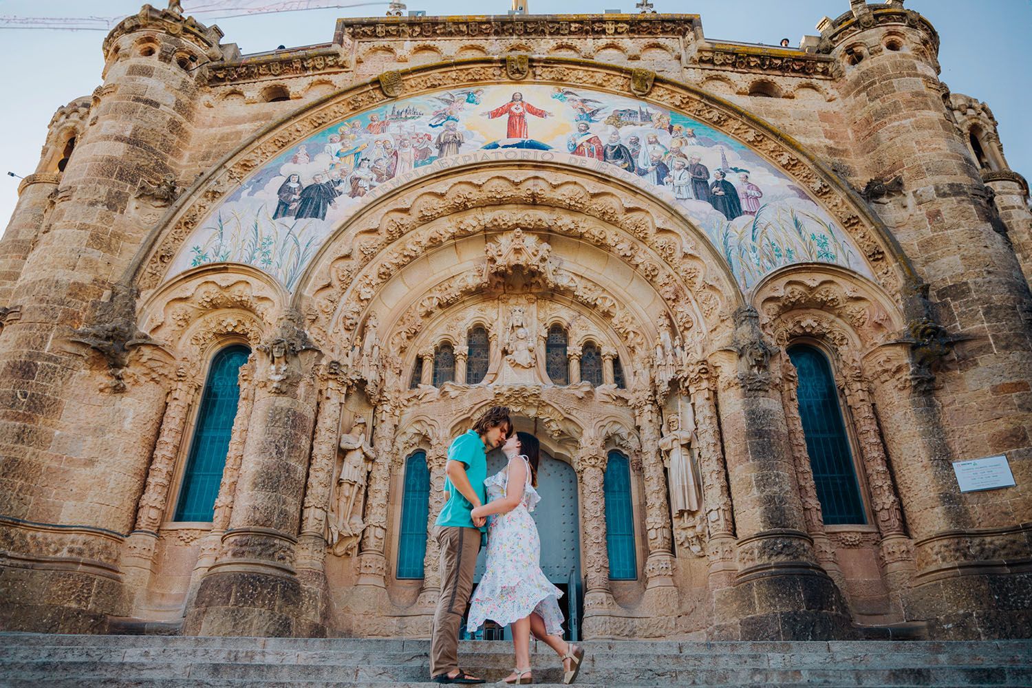 Cozy afternoon couple photoshoot at Tibidabo mountain in Barcelona, watching the Mediterranean sunset in complete peace.