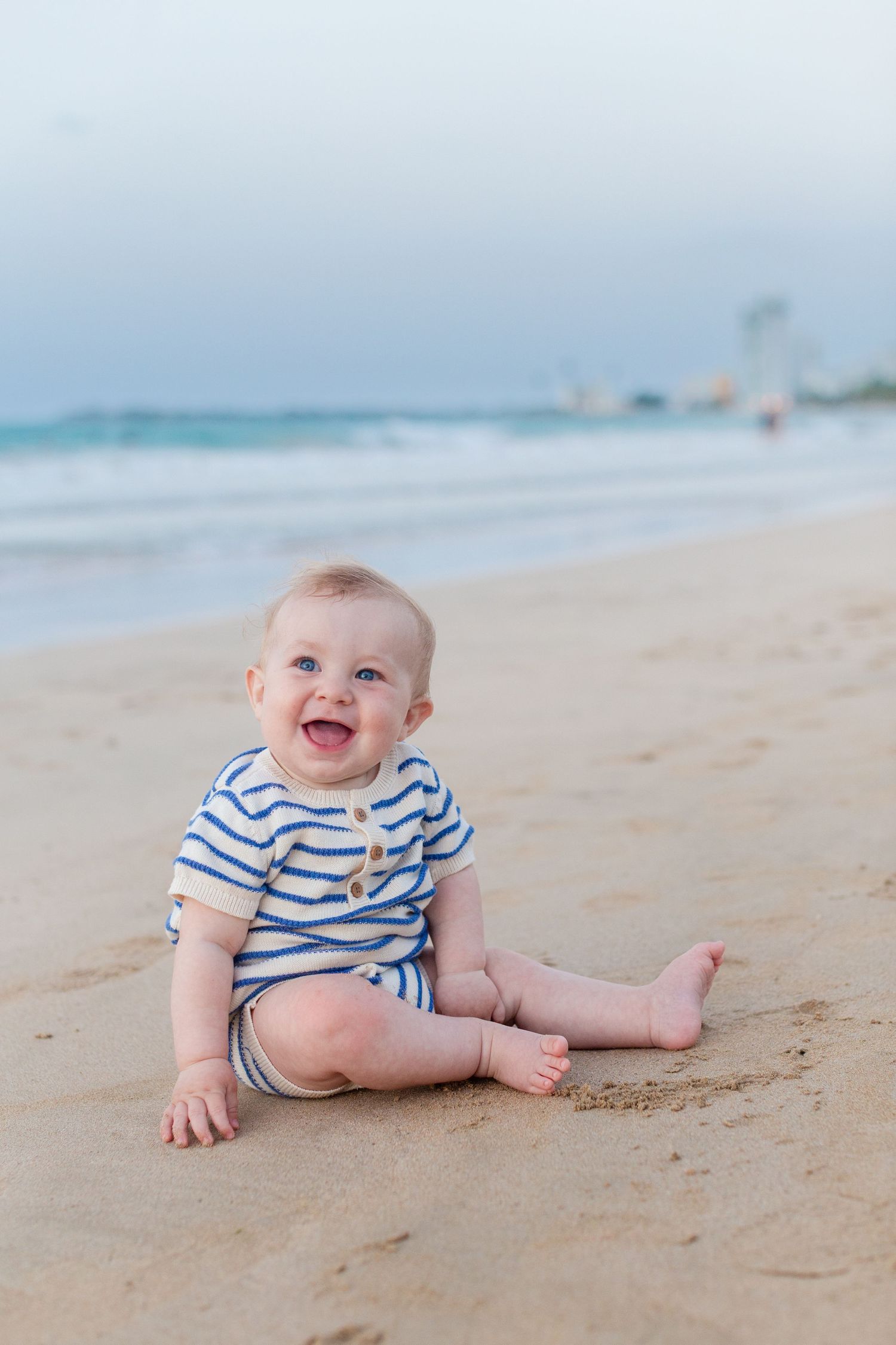 Portrait of a baby on the beach in Isla Verde, Carolina, Puerto Rico.