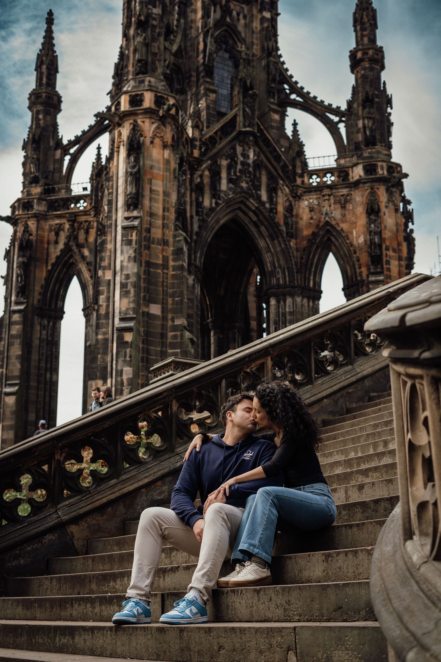 Couple during a Love Story photoshoot in Princes Street Gardens, Edinburgh, Scotland.