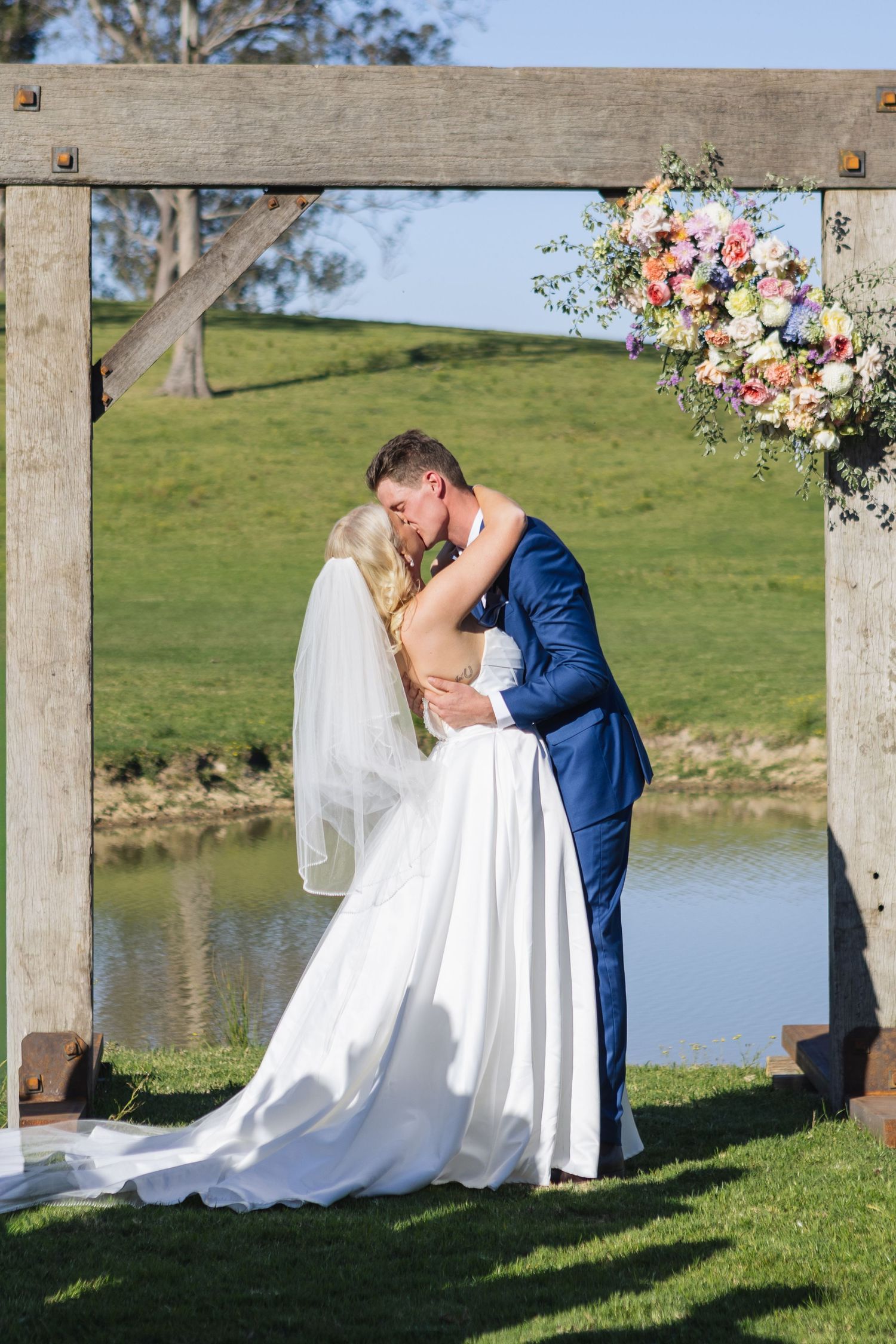 Jess and Lachie’s wedding ceremony overlooking the dam at Dungog Weddings