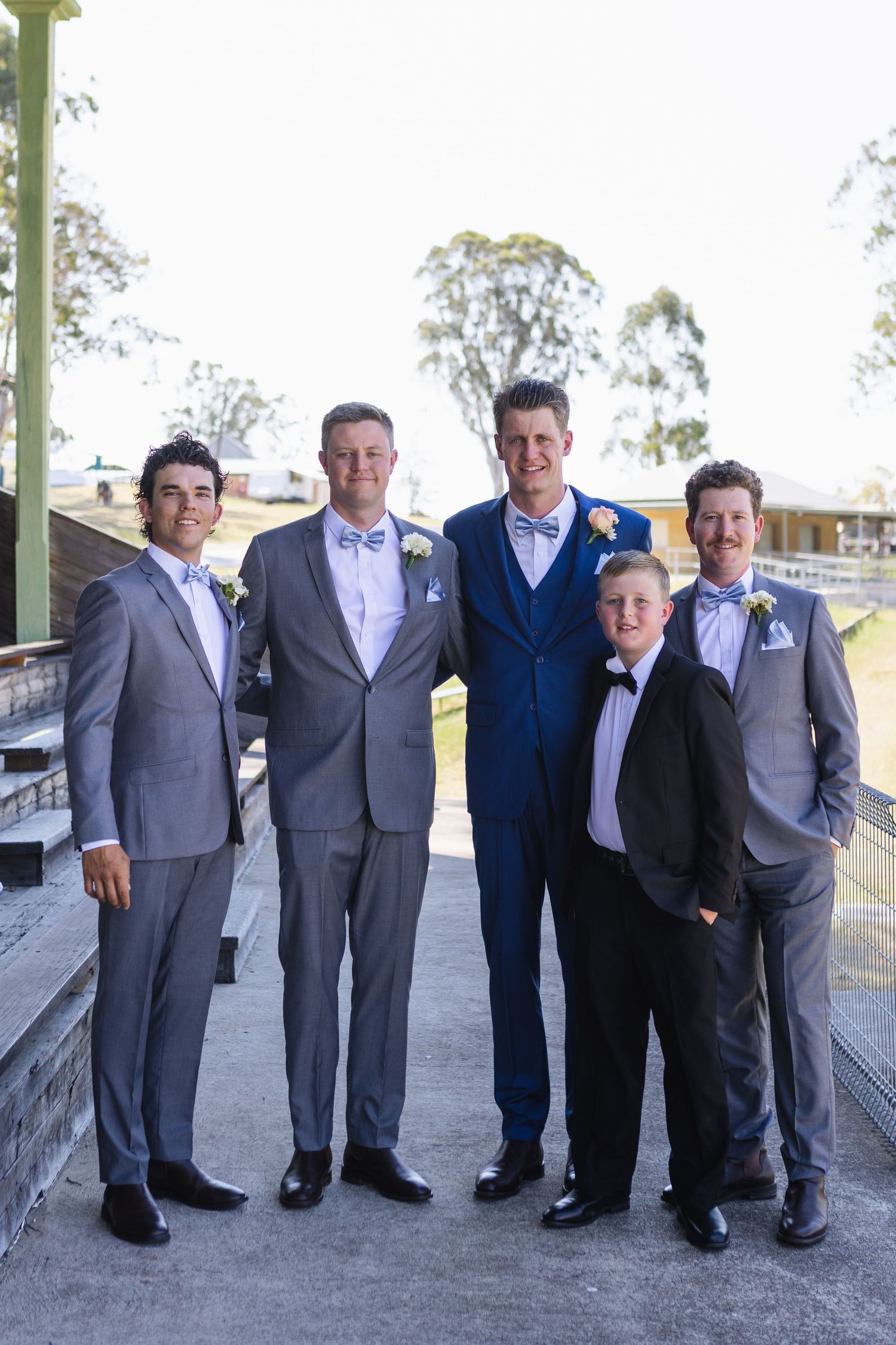 Groomsmen and groom hugging at Jess and Lachie’s wedding at Dungog Weddings in the Hunter Valley NSW