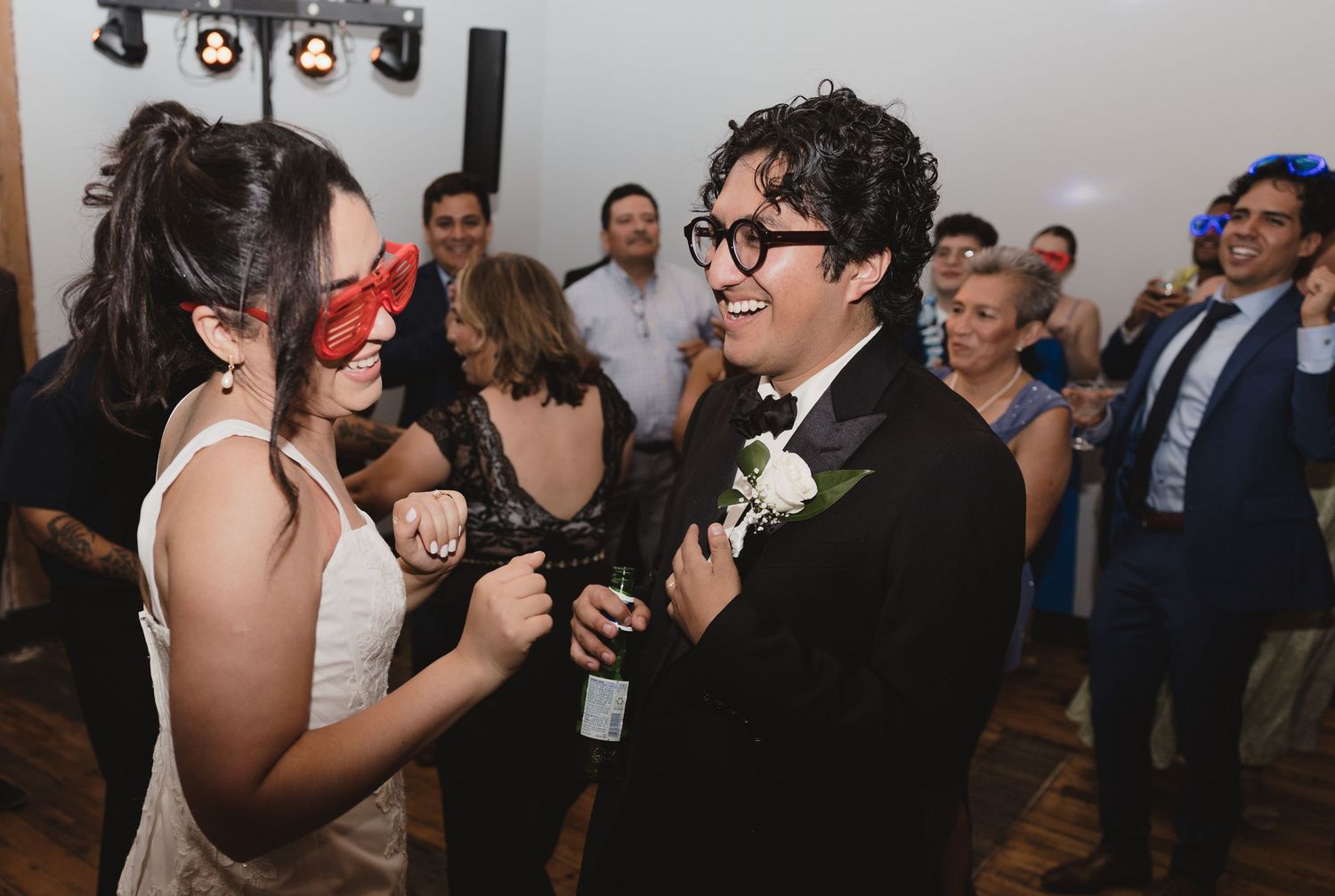 Wedding guests celebrating on the dance floor at The Maxwell Room in Nashville.