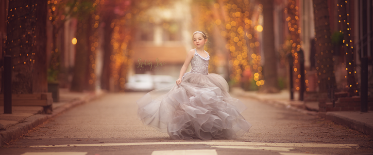 Girl posing for portrait in Rittenhouse Square on Addison Street in Philadelphia