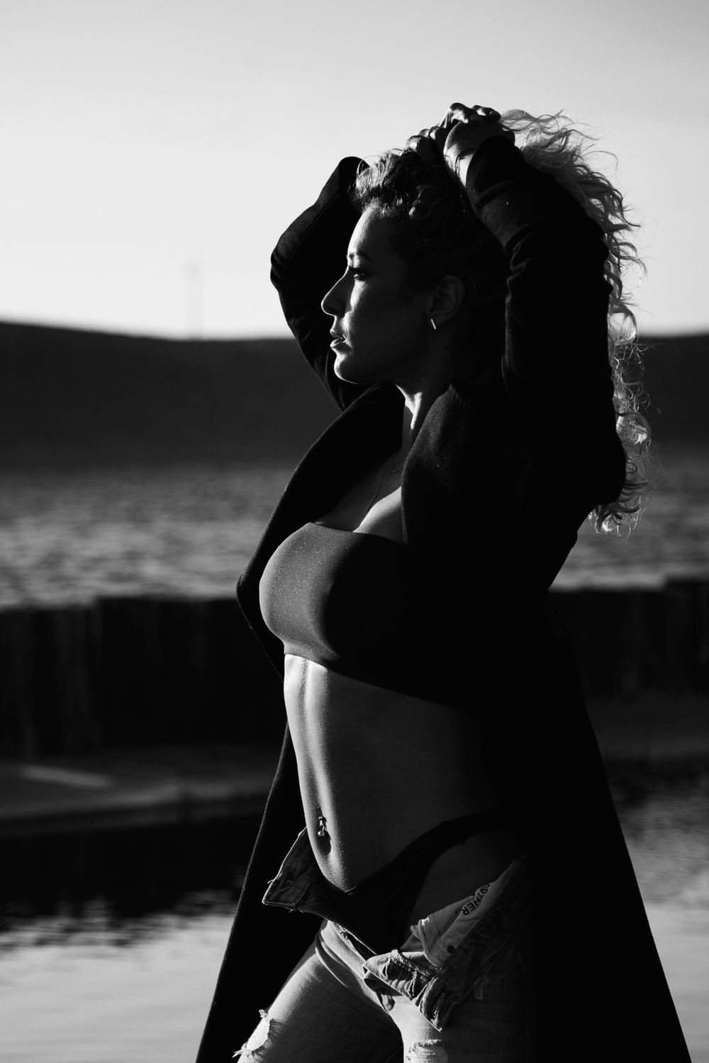 Artistic black and white female portrait photographed by fine art photographer in Houston