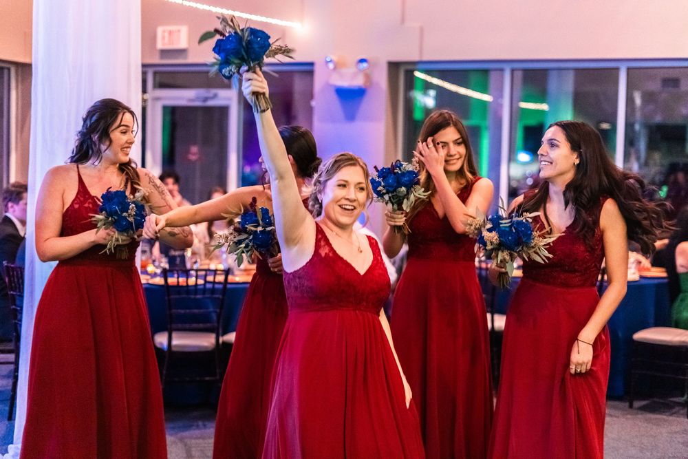 Channel Side Club in Palm Coast Florida. Wedding photography of fun wedding reception. People dancing at party.
