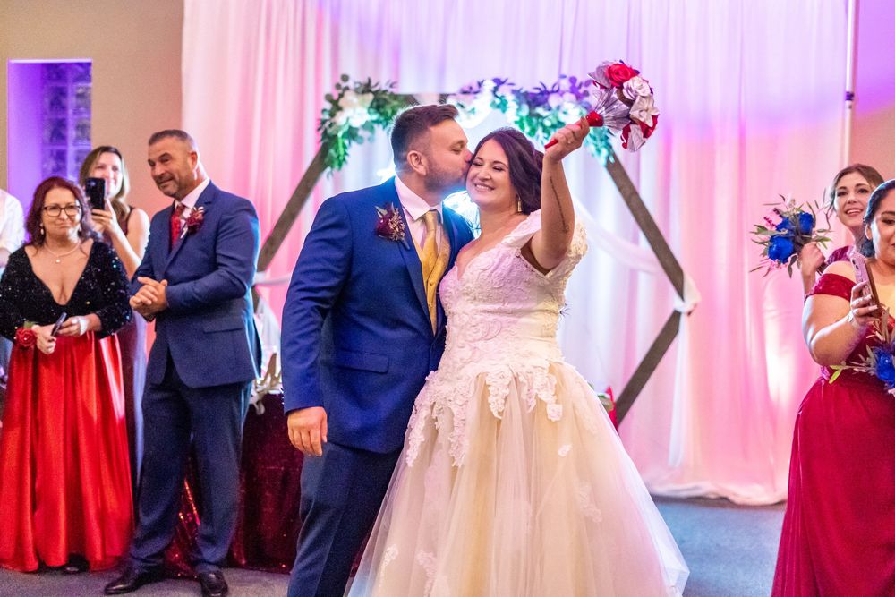 Channel Side Club in Palm Coast Florida. Wedding photography of fun wedding reception. People dancing at party.