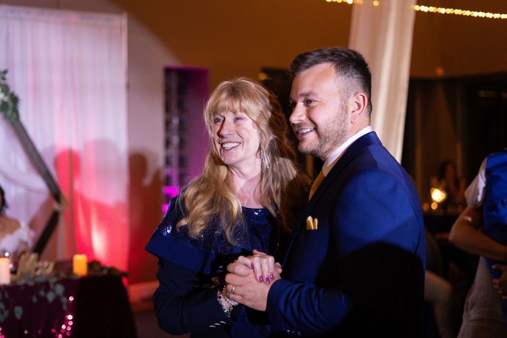 Channel Side Club in Palm Coast Florida. Wedding photography of fun wedding reception. People dancing at party.