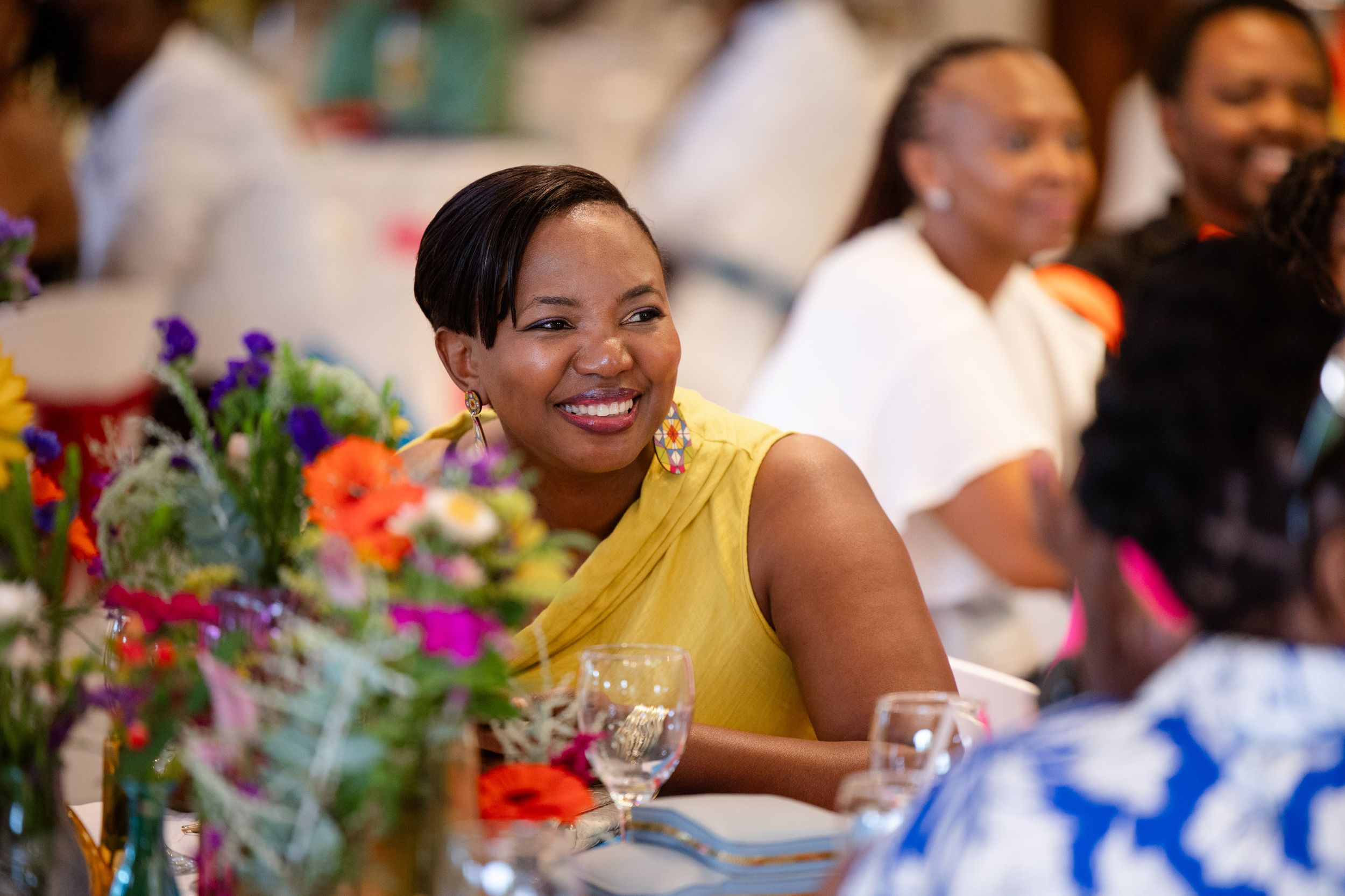 Guest enjoying a colourful awards event photographed by Rynali Photography.