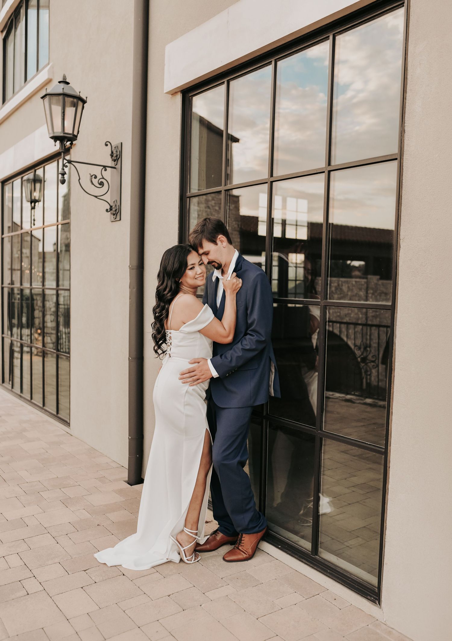 Engaged couple sharing a romantic look during their modern Chapel at Palacios photo session