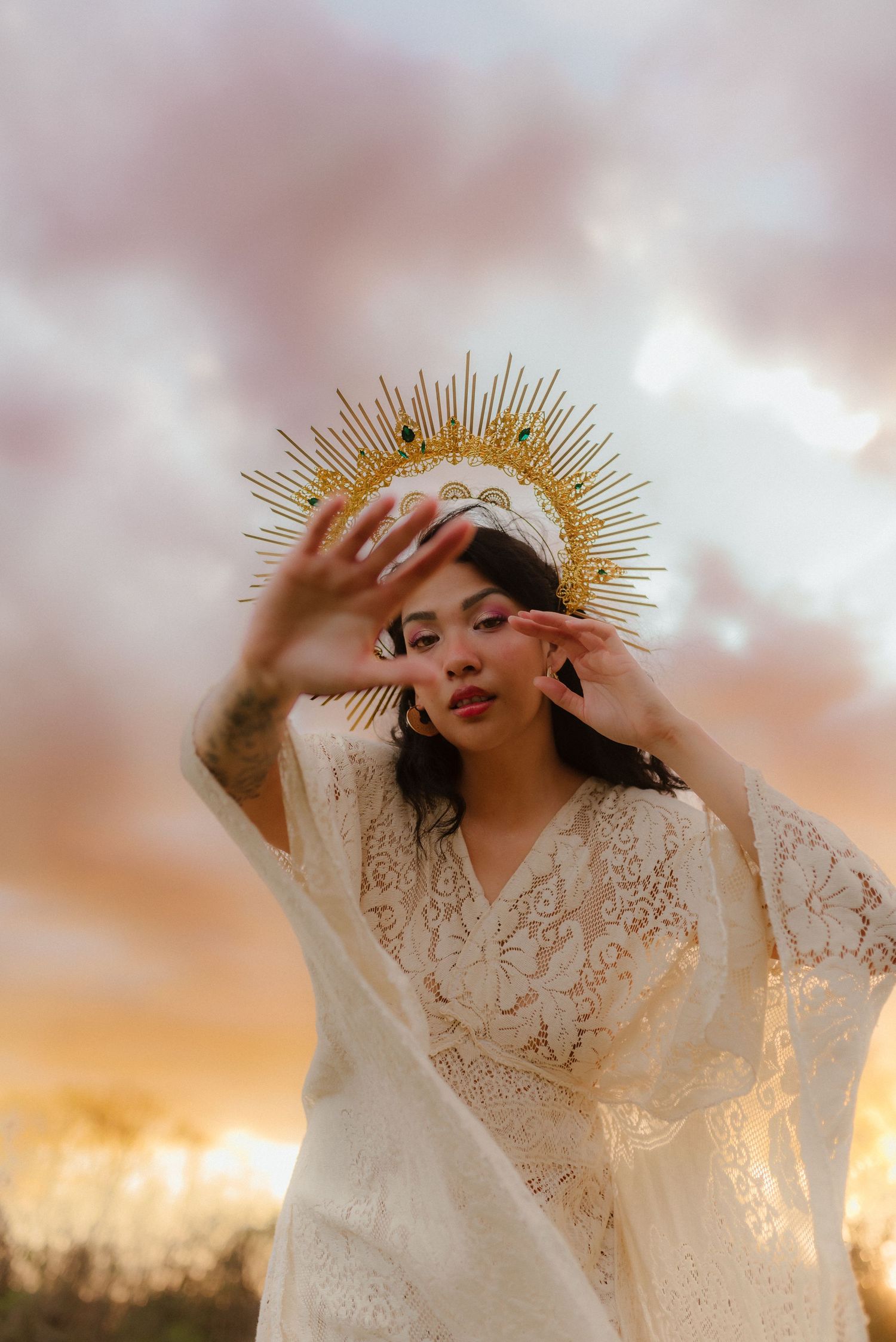 Woman in Vintage lace dress and crown holds hands out to frame her face, Creative session, Birthday Shoot, Golden hour, Fort Campbell, TN