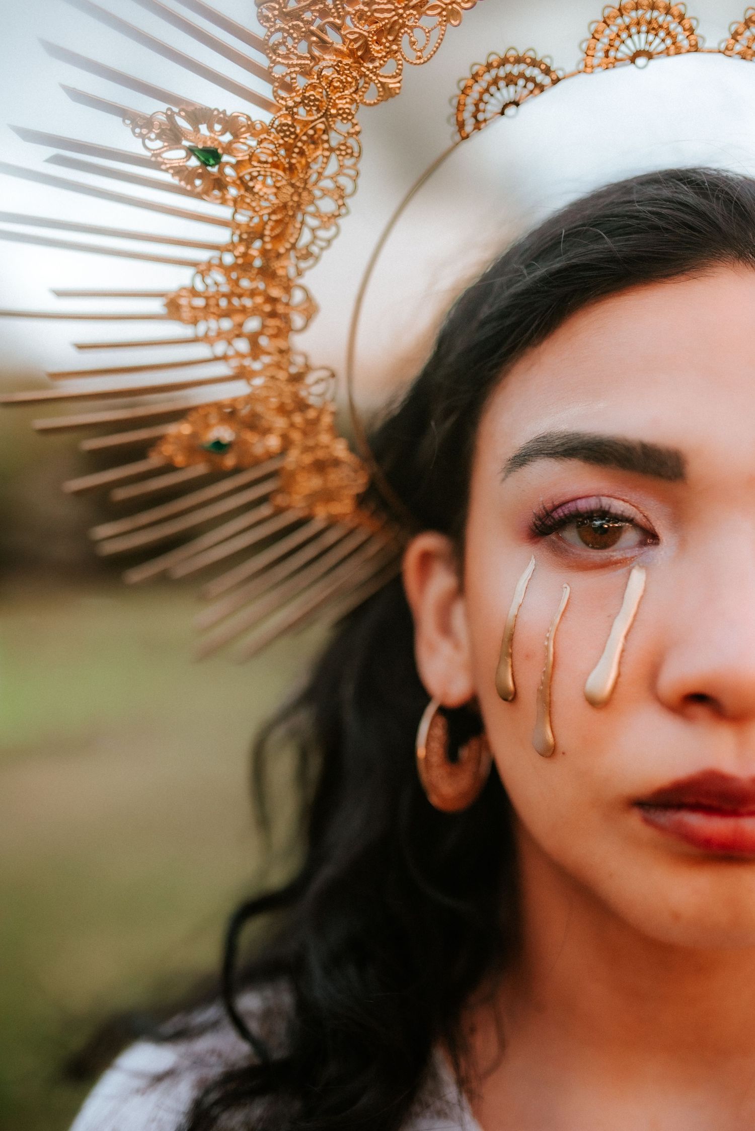Half a woman's face with crown and gold tears, golden hour, portrait photographer, Clarksville Tennessee, Birthday Session, Creative