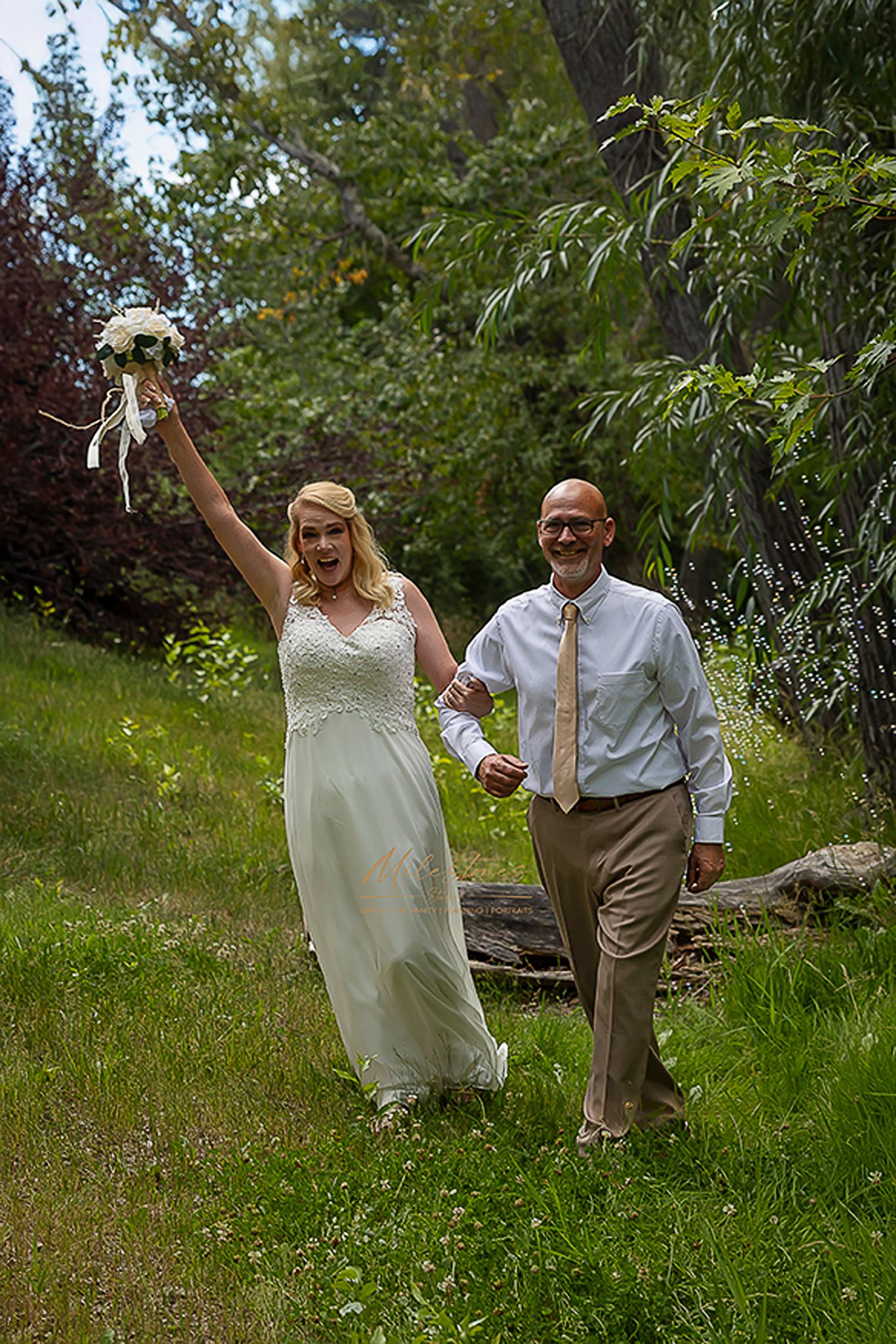 they did it. Bride and Groom celebrate after saying Idaho Idaho elopement ©Milestones Studios LLC