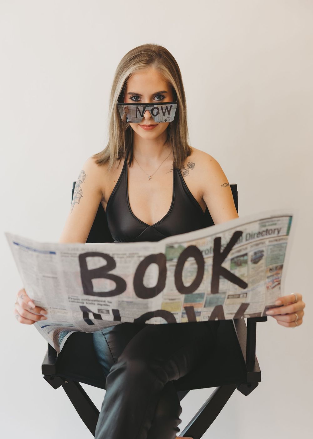 Branding session for hairstylist. With a Book Now sign.