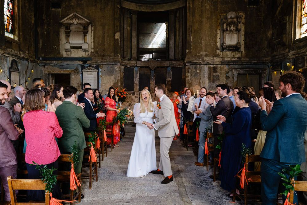 bride having a great time in the asylum chapel