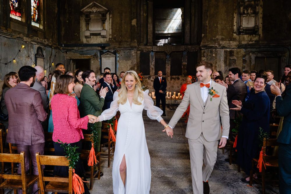 bride and groom walking down the aisle