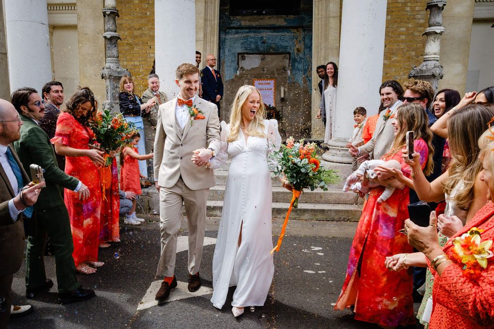 bride and groom outside chapel in London