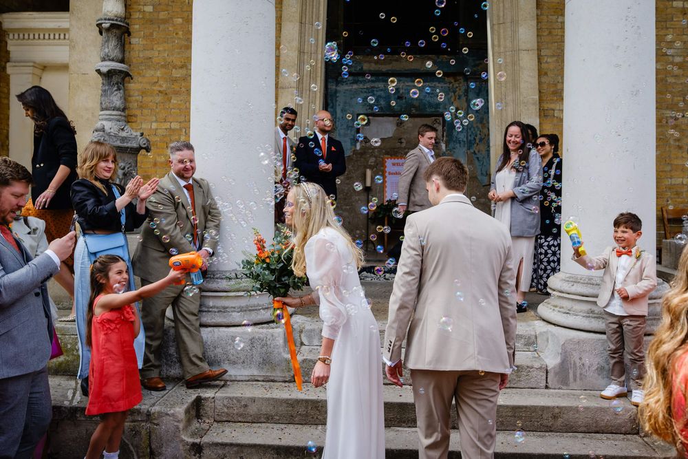wedding with children having bubble guns