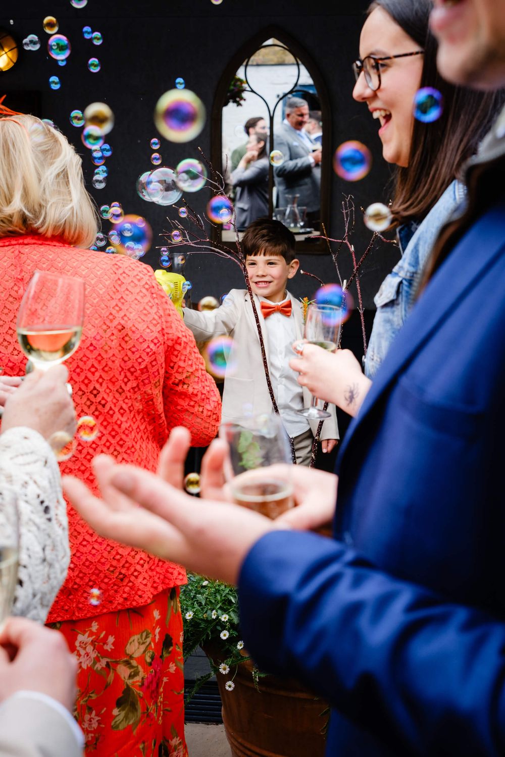 children playing with bubble gun at wedding in London