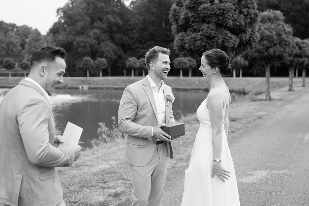 A black and white photo sequence shows a couple sharing a romantic moment while reading letters outdoors.