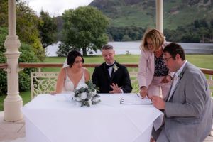 wedding photography in Cumbria - groom looking at his ring