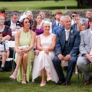 wedding photography in Cumbria - guests watching the ceremony