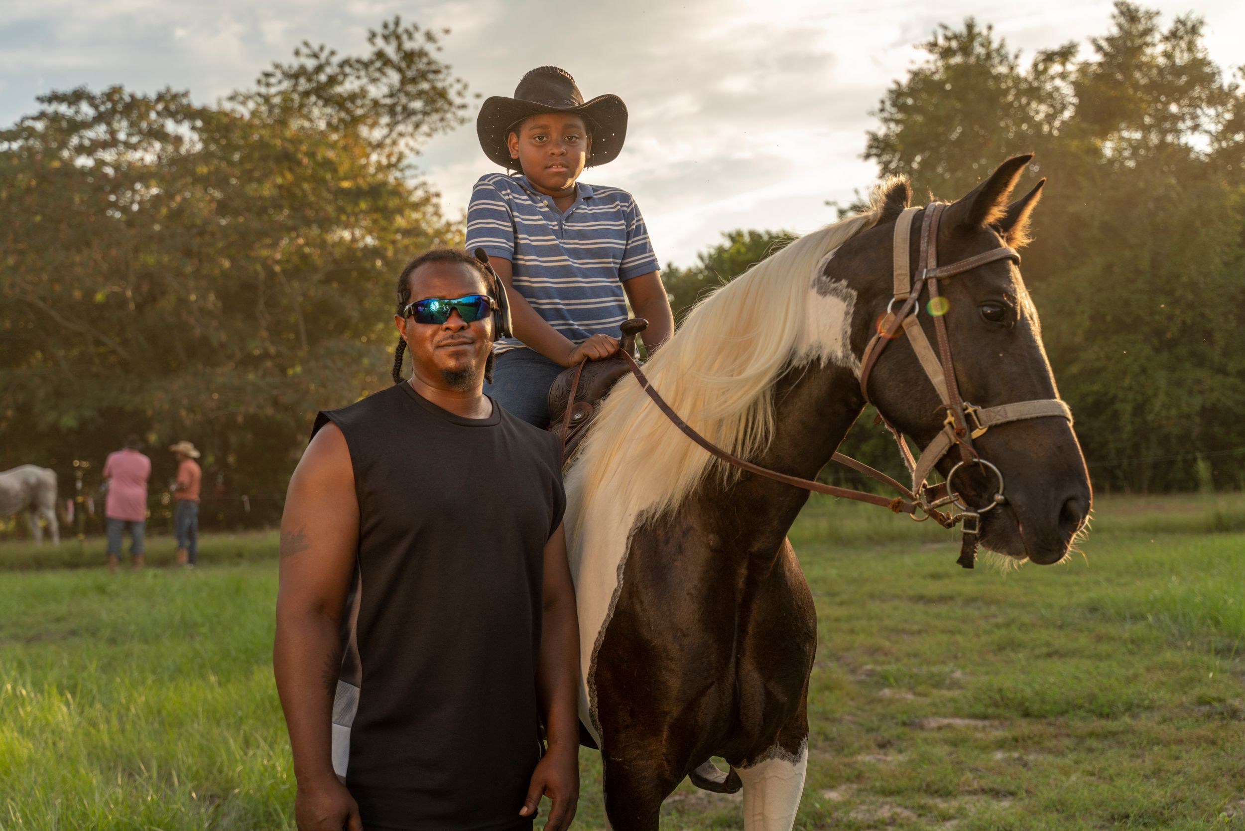 Five sequential images show a rider bonding with a dark horse in a sunlit field during an evening training session.