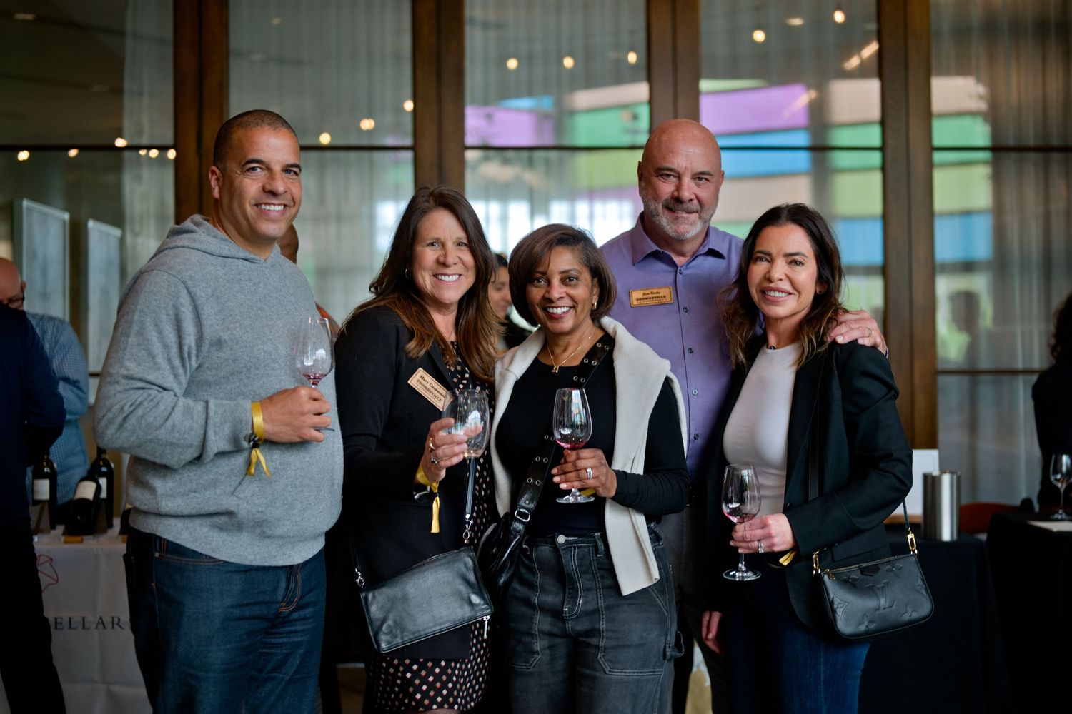 Professionals network and enjoy a wine tasting at a corporate event hosted by CIA Copia and Coombsville Growers Association in Napa Valley.
