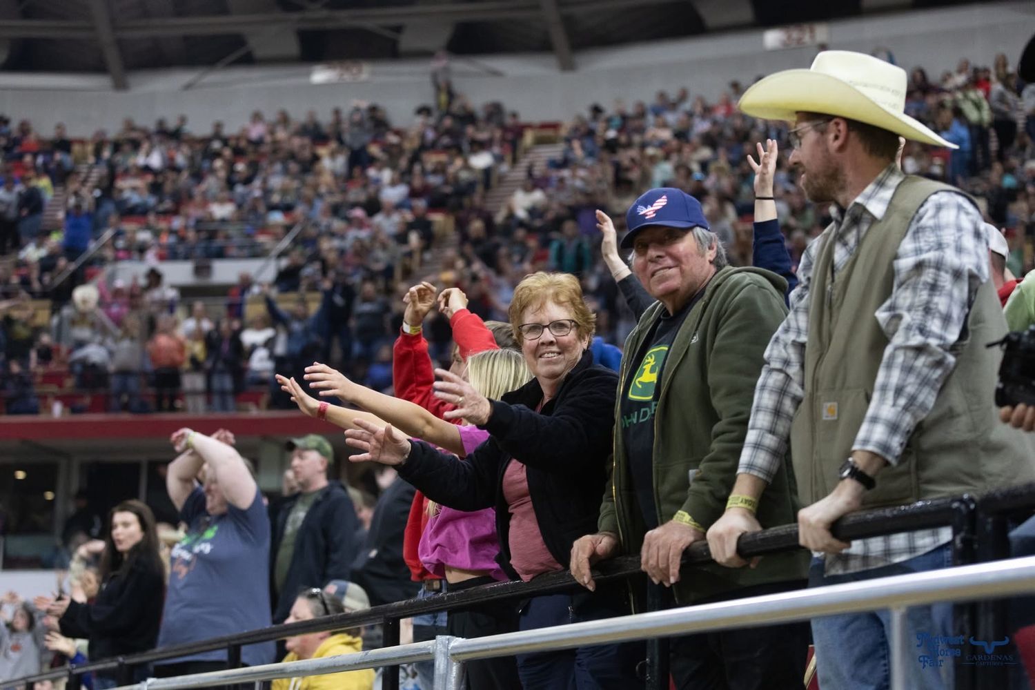 Spectators watch from stadium seating at a rodeo event. Wisconsin Pro Rodeo PRCA Rodeo Photographer Dakota Cardenas