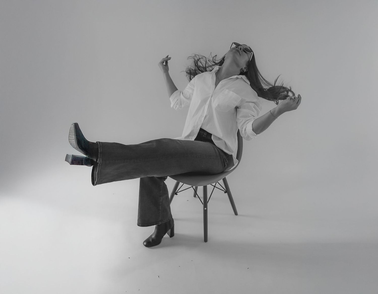 West Michigan Photographer: blurred black and white motion photo of a couple dancing on the beach
