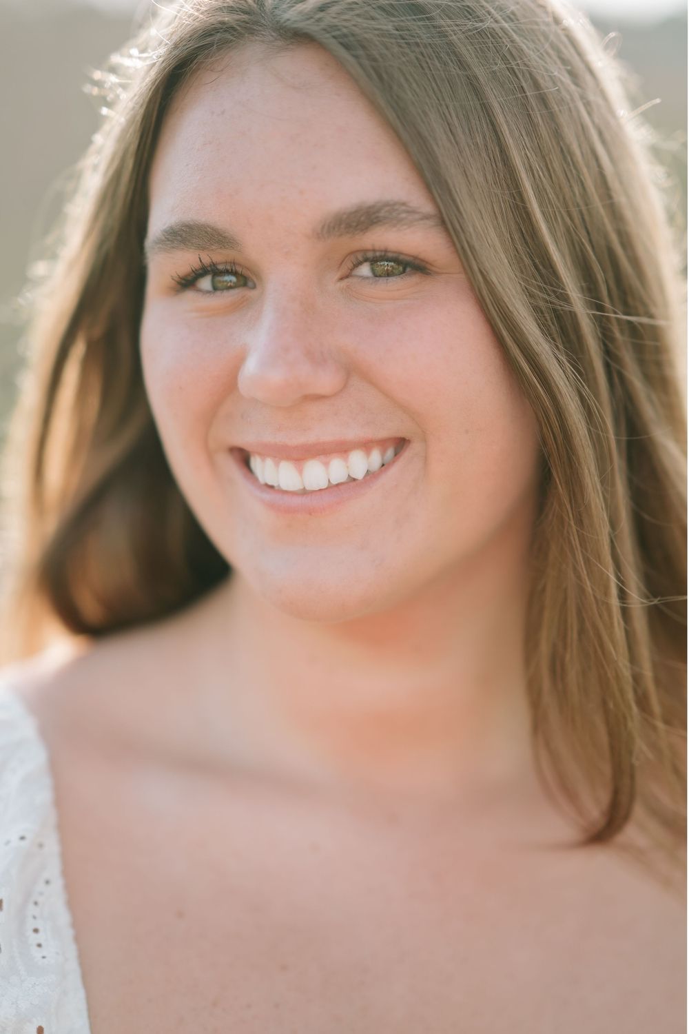 Elegant senior portrait in coastal Georgia at Driftwood Beach, Jekyll Island, captured by St. Simons Island senior photographer.