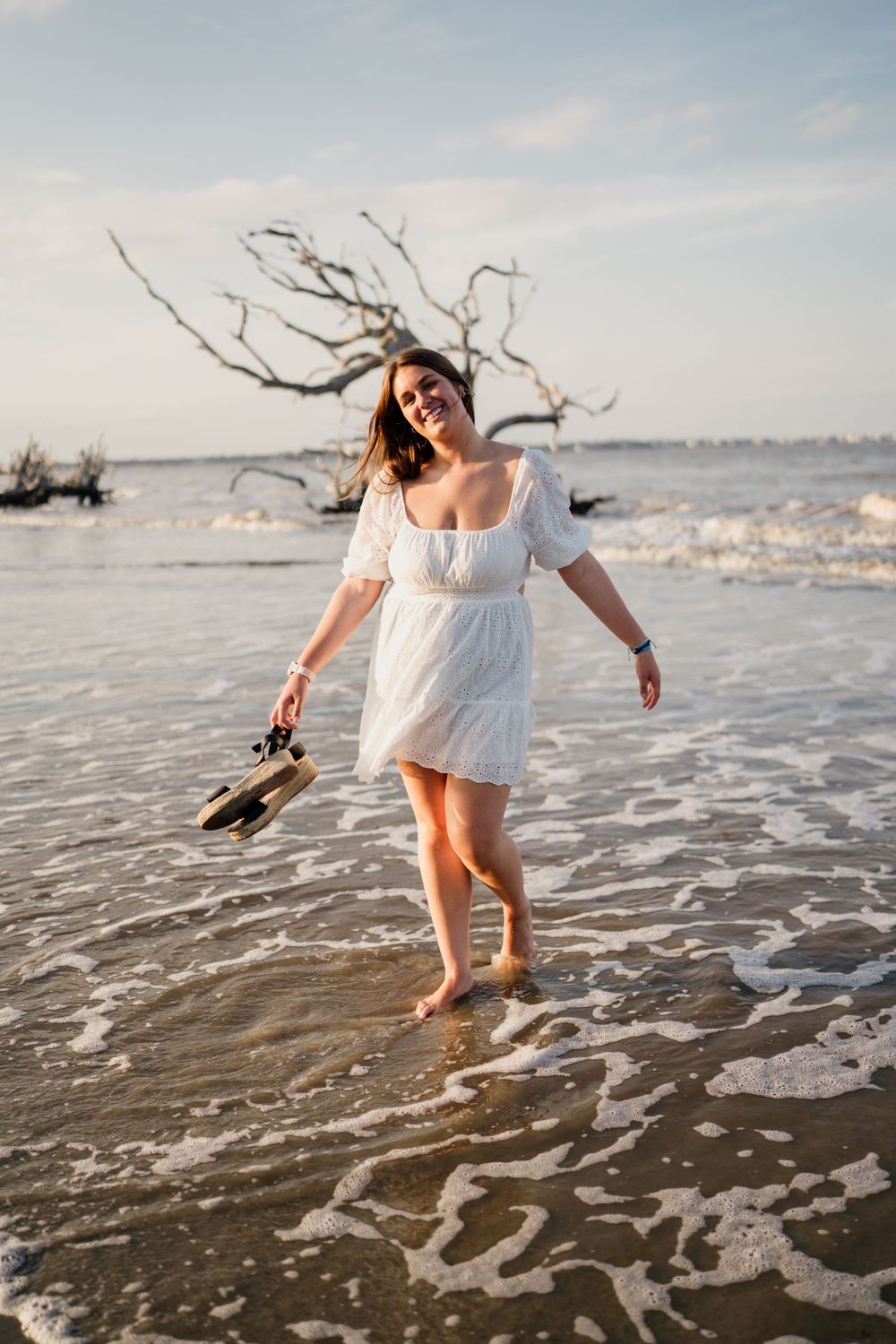 Outdoor senior photo at Driftwood Beach, Jekyll Island GA, by Lindy Rebro, Golden Isles portrait photographer.