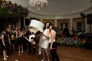 Editorial Image of Lesbian wedding celebrating after breaking a piñata.