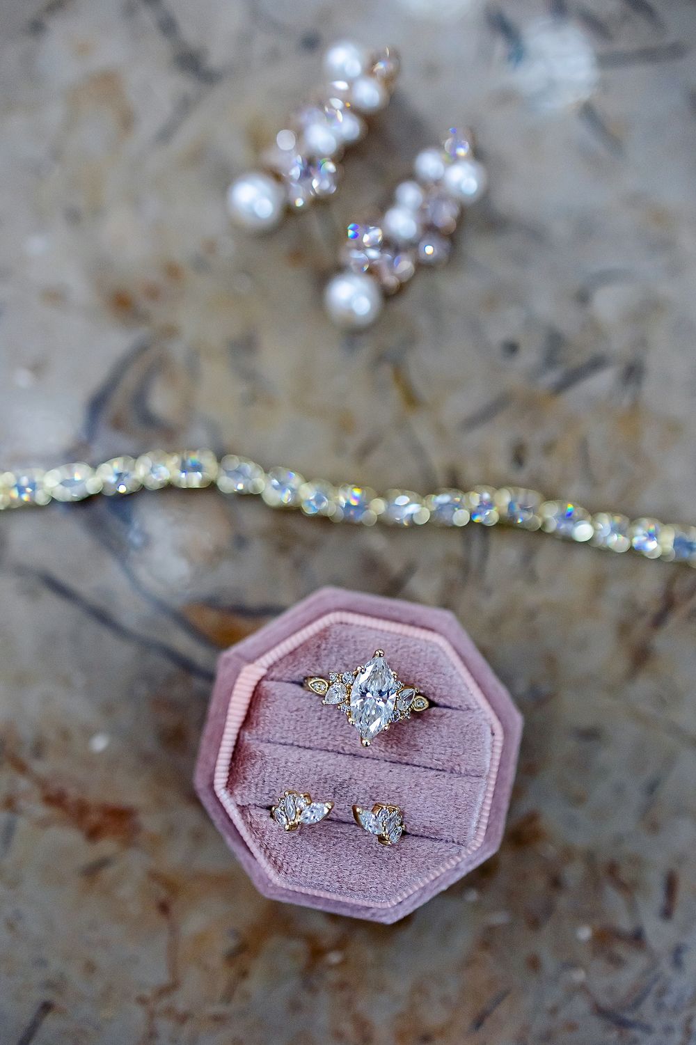 Wedding rings and bridal jewelry styled for Allie and Graham’s Riviera Maya wedding.