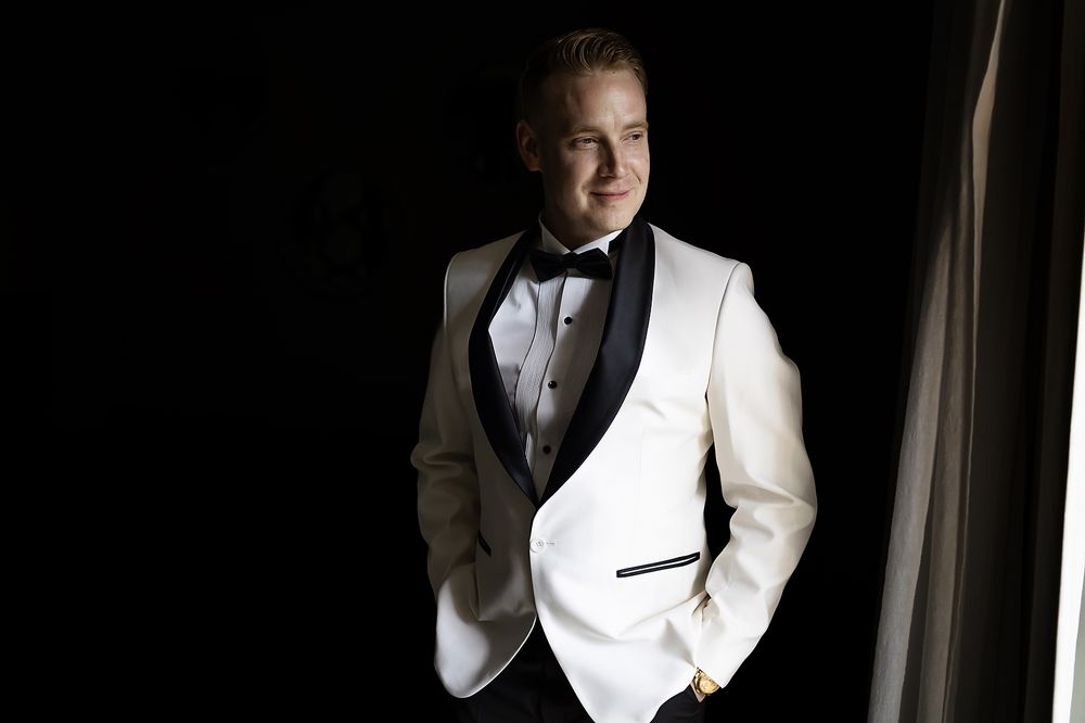 Groom portrait in elegant light before the ceremony at The Fives.
