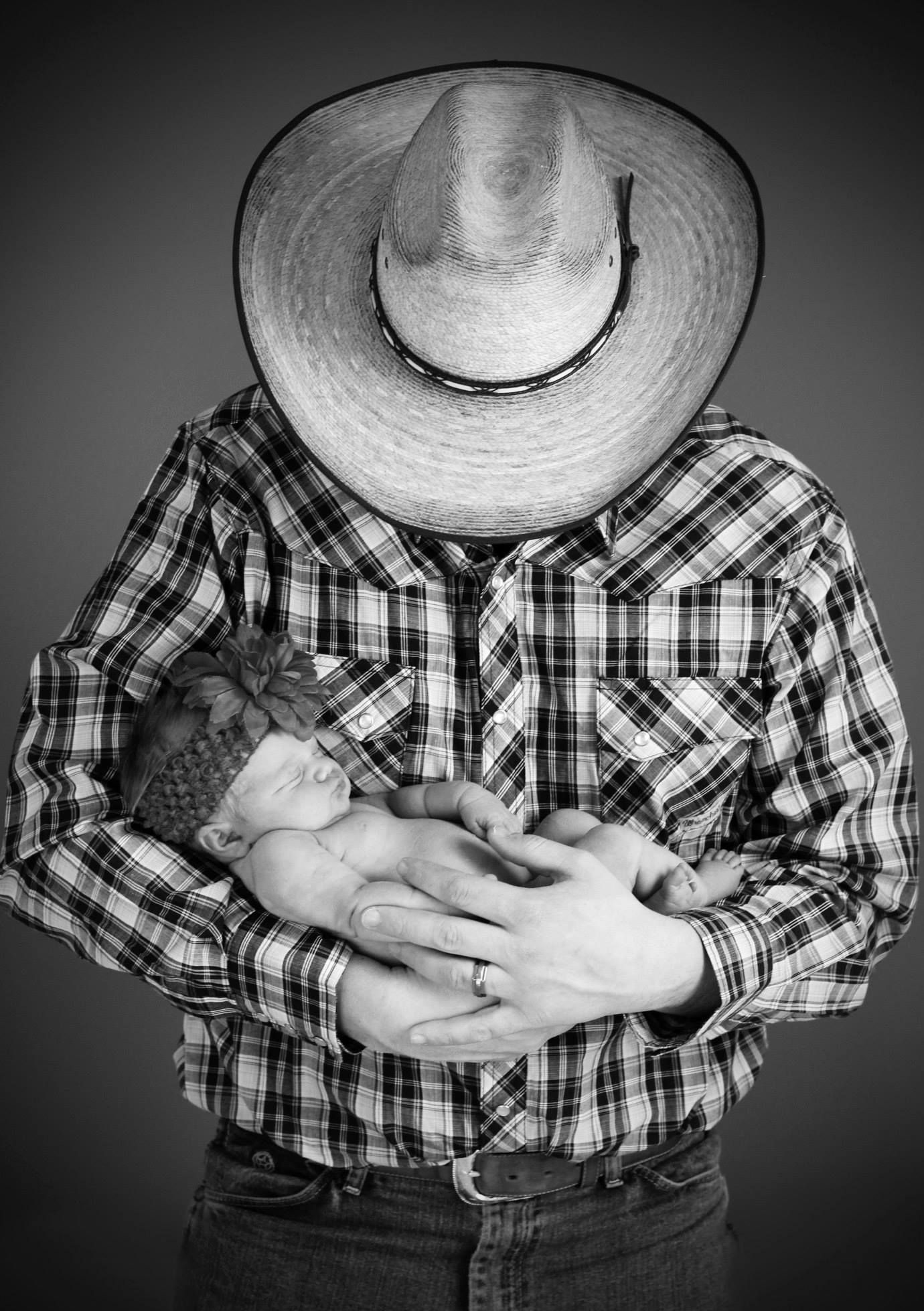 Black & White Father in Cowboy Hat with Newborn Daughter