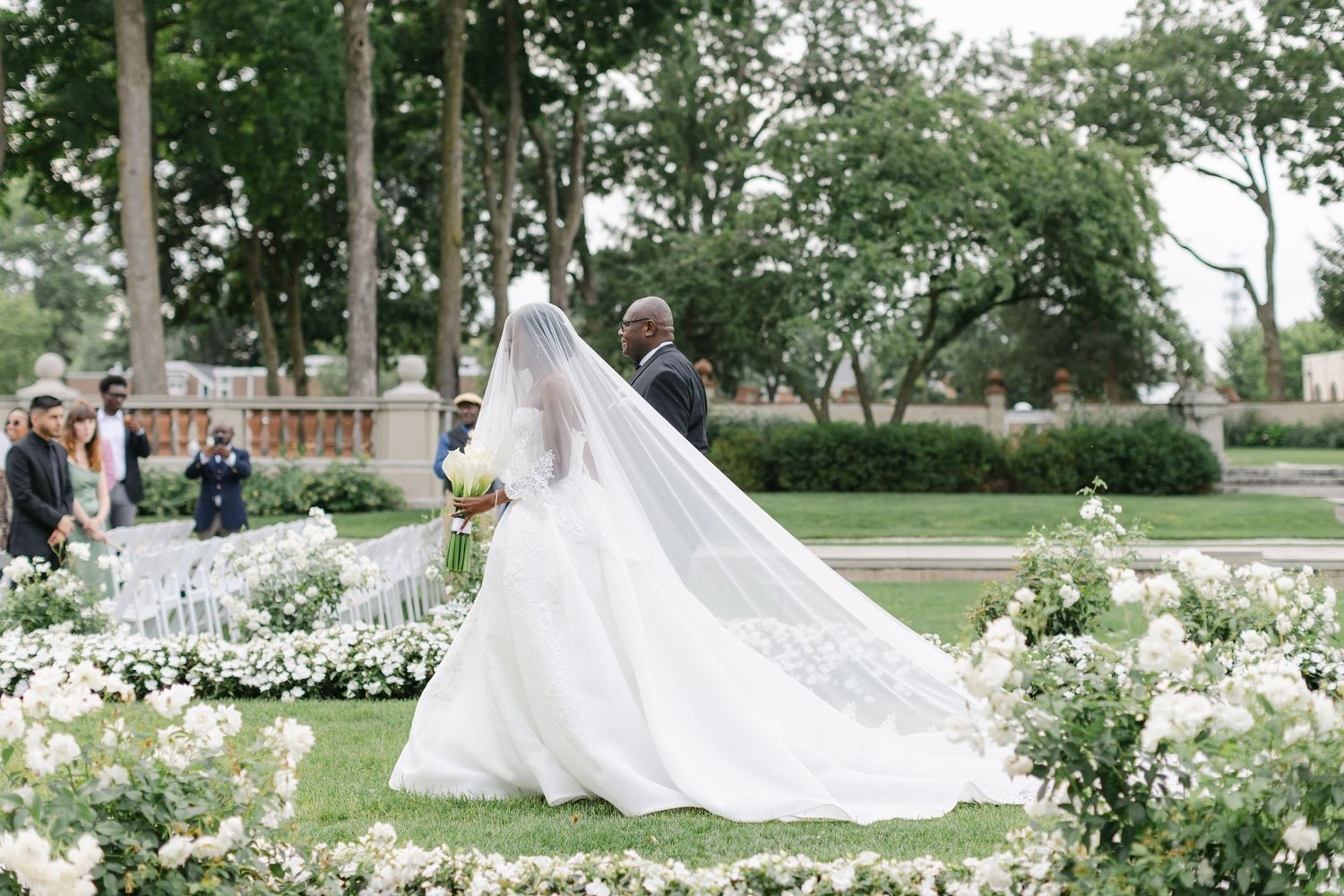 The Armour House Wedding in Lake Forest, IL - Bride walking down the aisle.