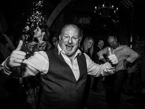 Black and white shots of party guests celebrating and having fun at a nighttime reception.