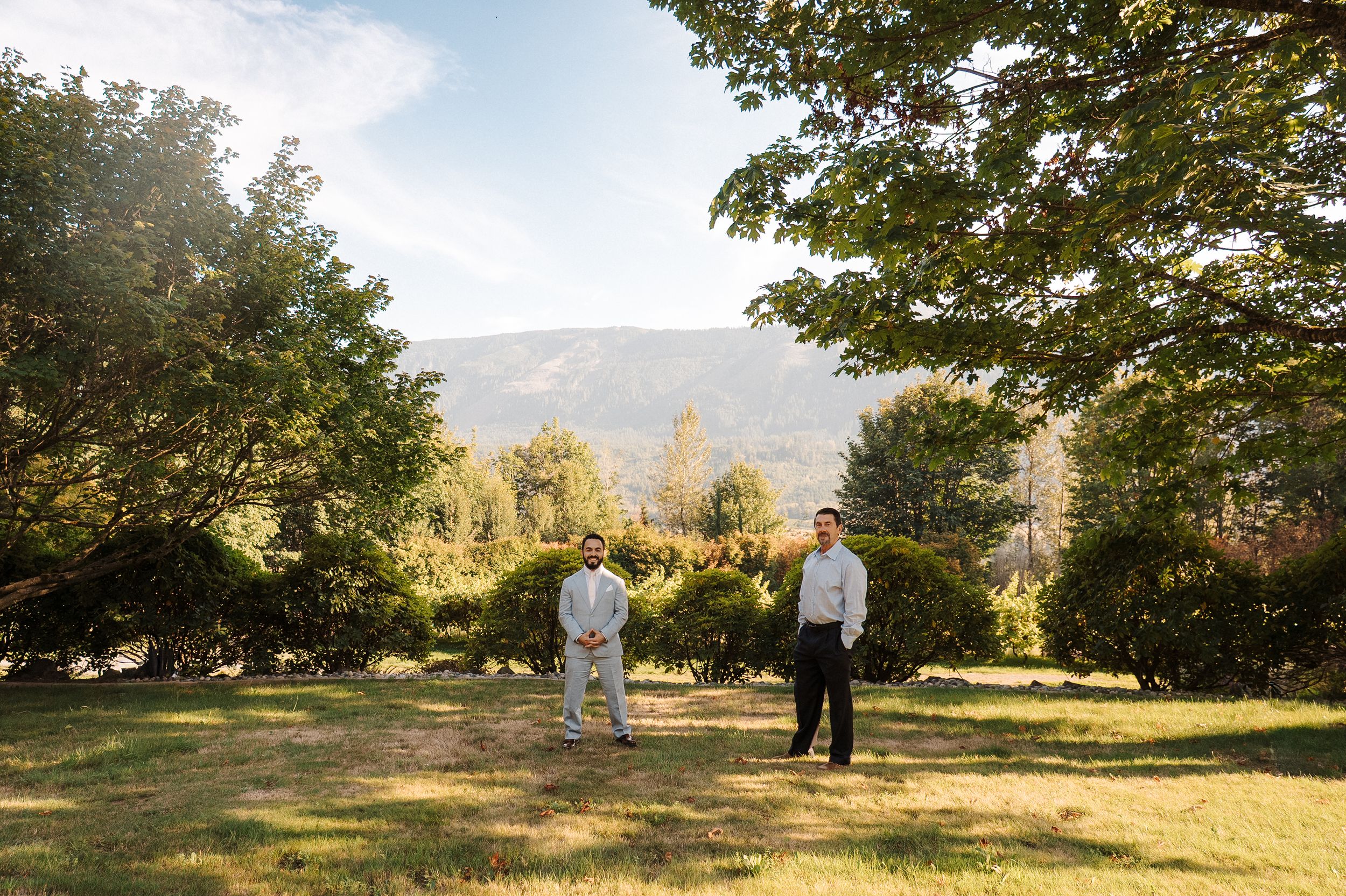 A scenic panoramic photo sequence showing a grassy field with trees during golden hour lighting.