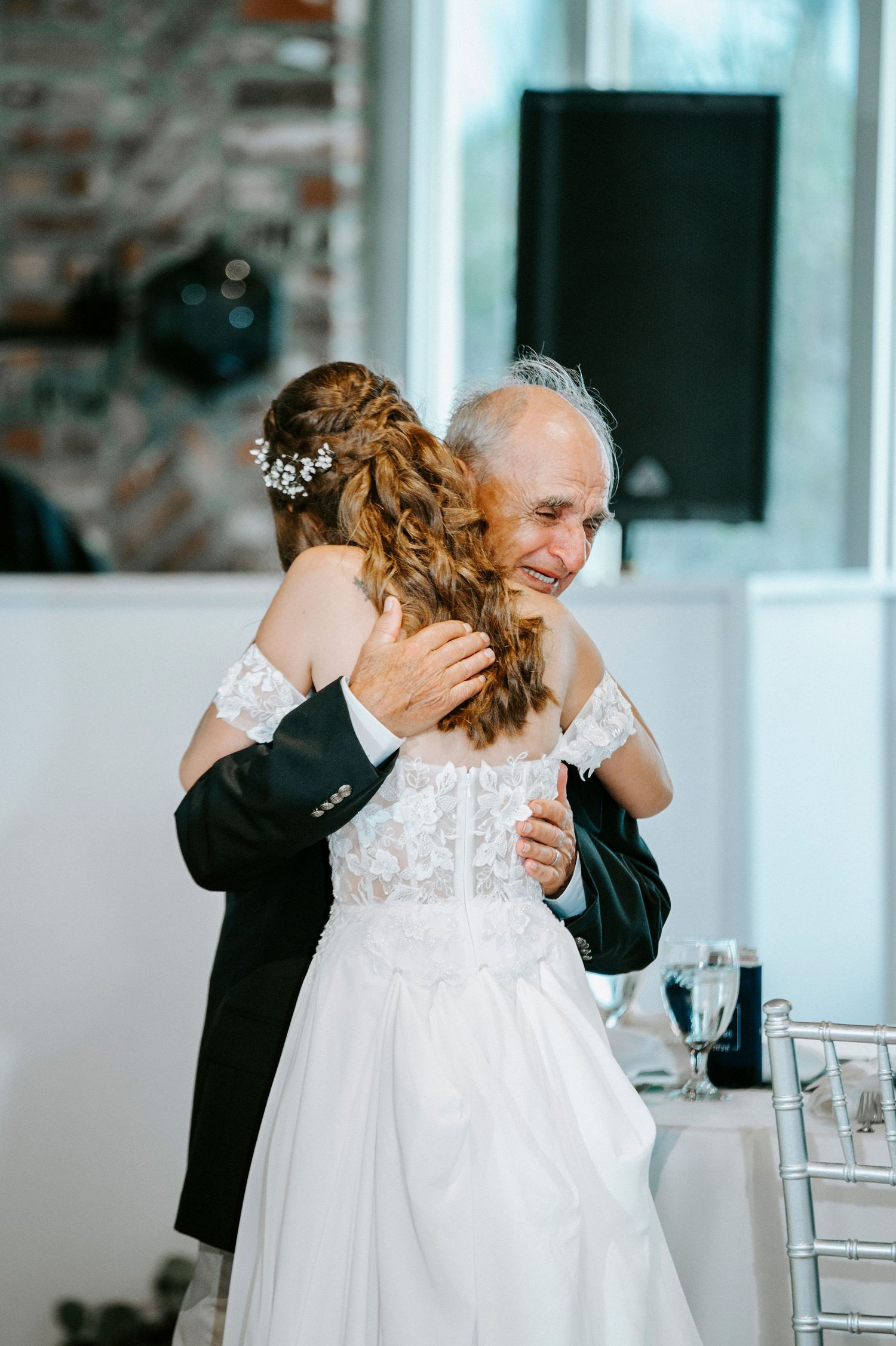 Emotional sequence of wedding photos showing intimate moments shared between a bride in white lace and her father.