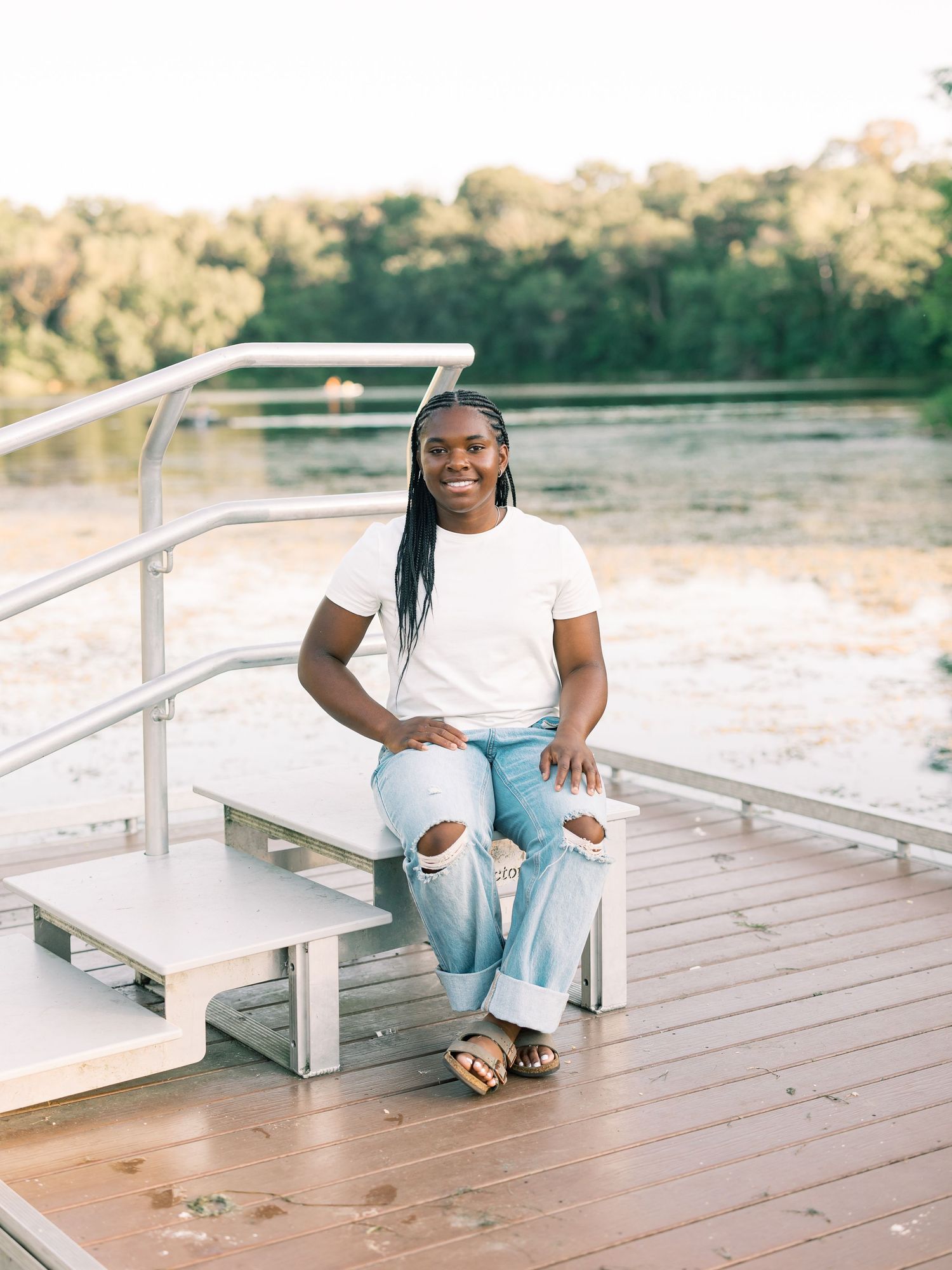 A series of candid poses on a wooden deck with a person wearing a white shirt and light colored pants.